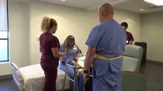 Physical Therapy Transfer Training  How To Transfer From Wheelchair To Bed [upl. by Doralynn]